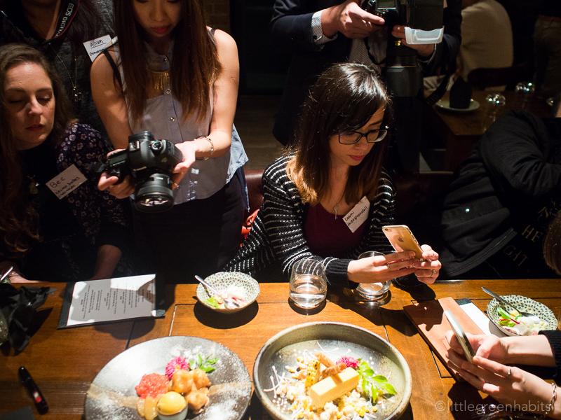 In Asia - food bloggers snapping photos of dessert